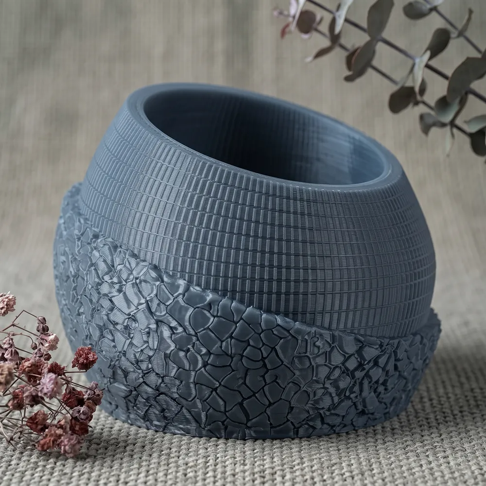 Vasija decorativa gris